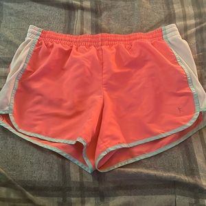 Set of athletic shorts - one pair worn once - the other never worn